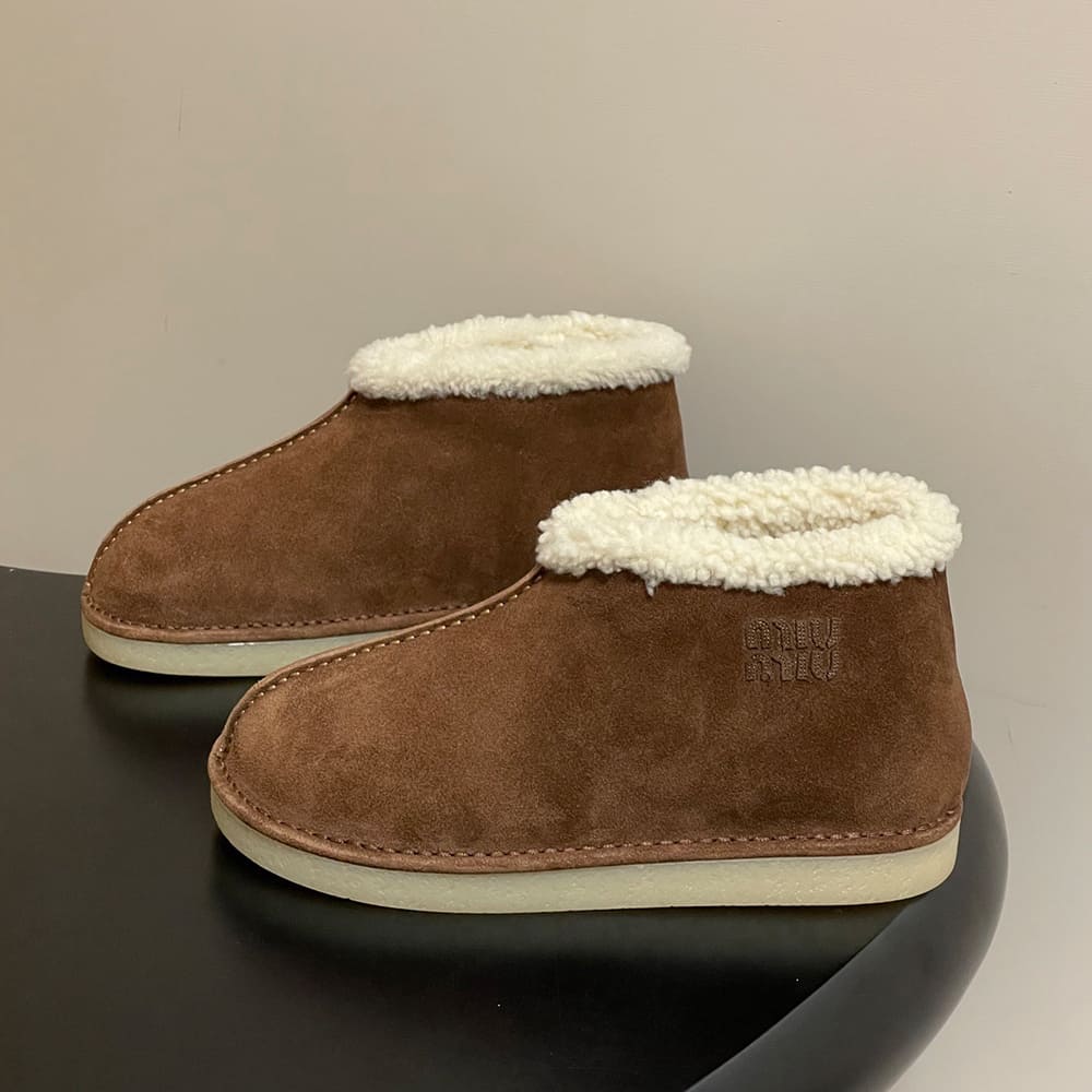 M1um1u Suede and shearling slip-on booties