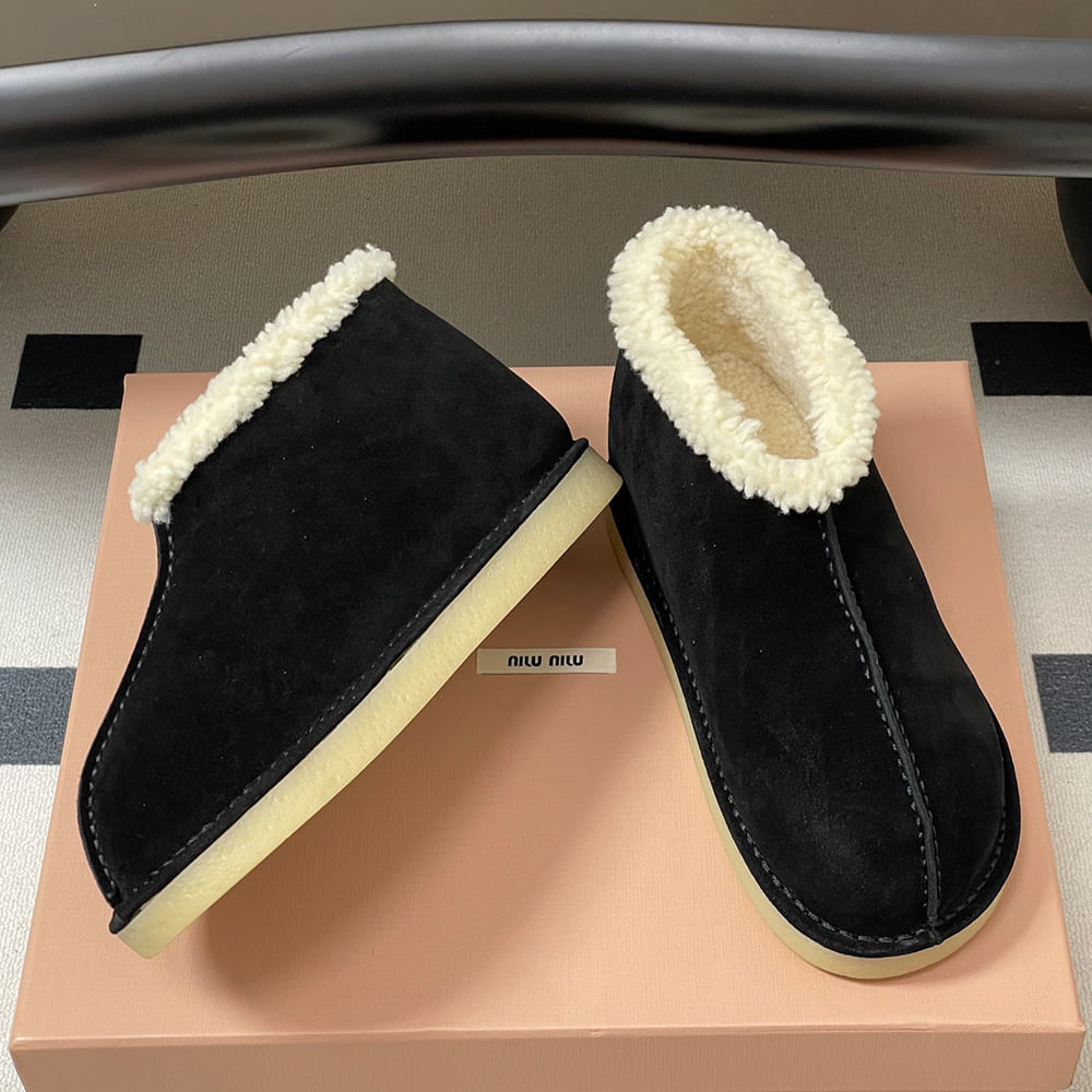 M1um1u Suede and shearling slip-on booties