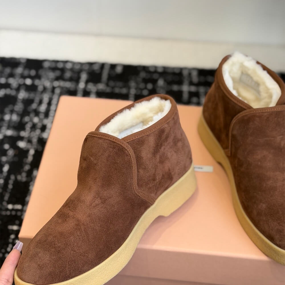 M1um1u Suede and shearling slip-on booties