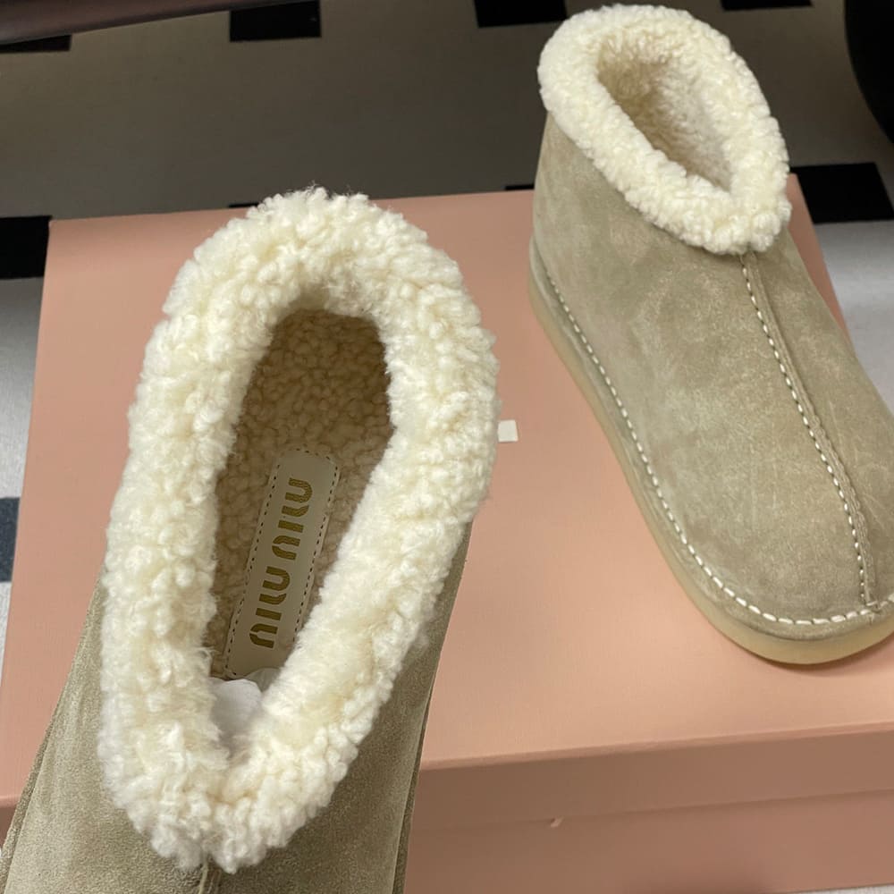 M1um1u Suede and shearling slip-on booties