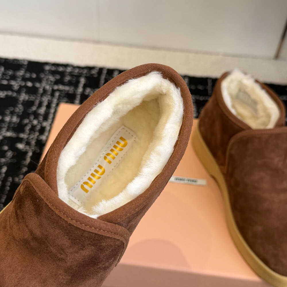 M1um1u Suede and shearling slip-on booties