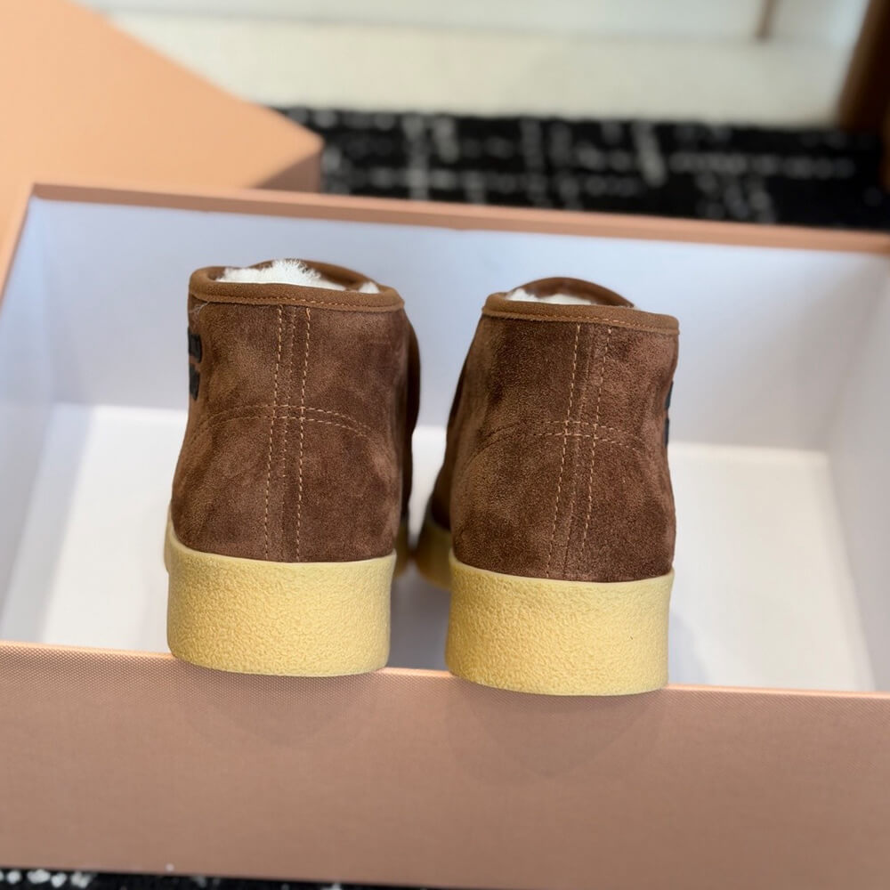 M1um1u Suede and shearling slip-on booties