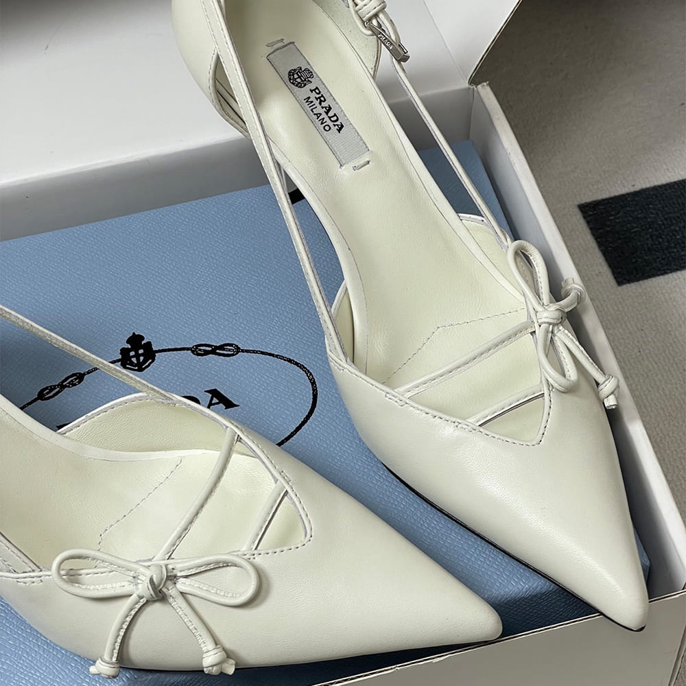 Pra*a Open-side leather pumps