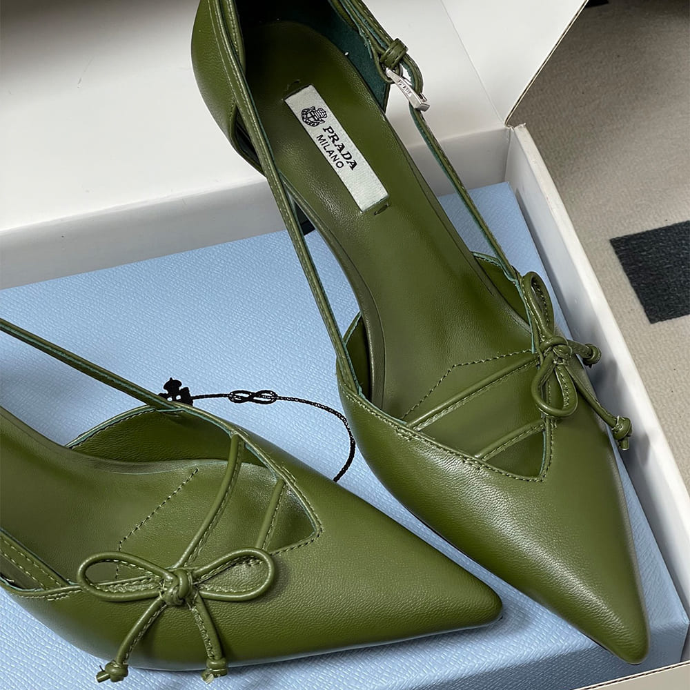 Pra*a Open-side leather pumps